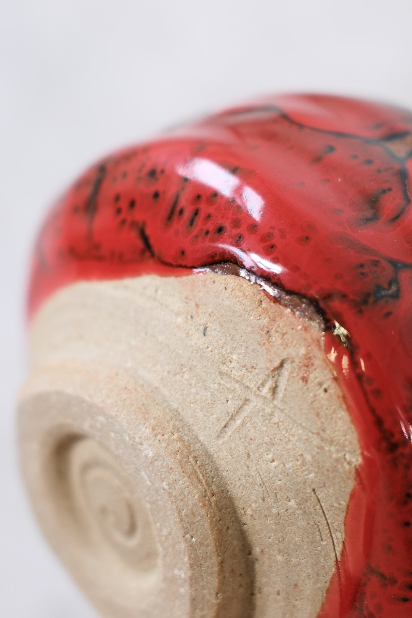 Japanese ceramic bowl with red lava glaze