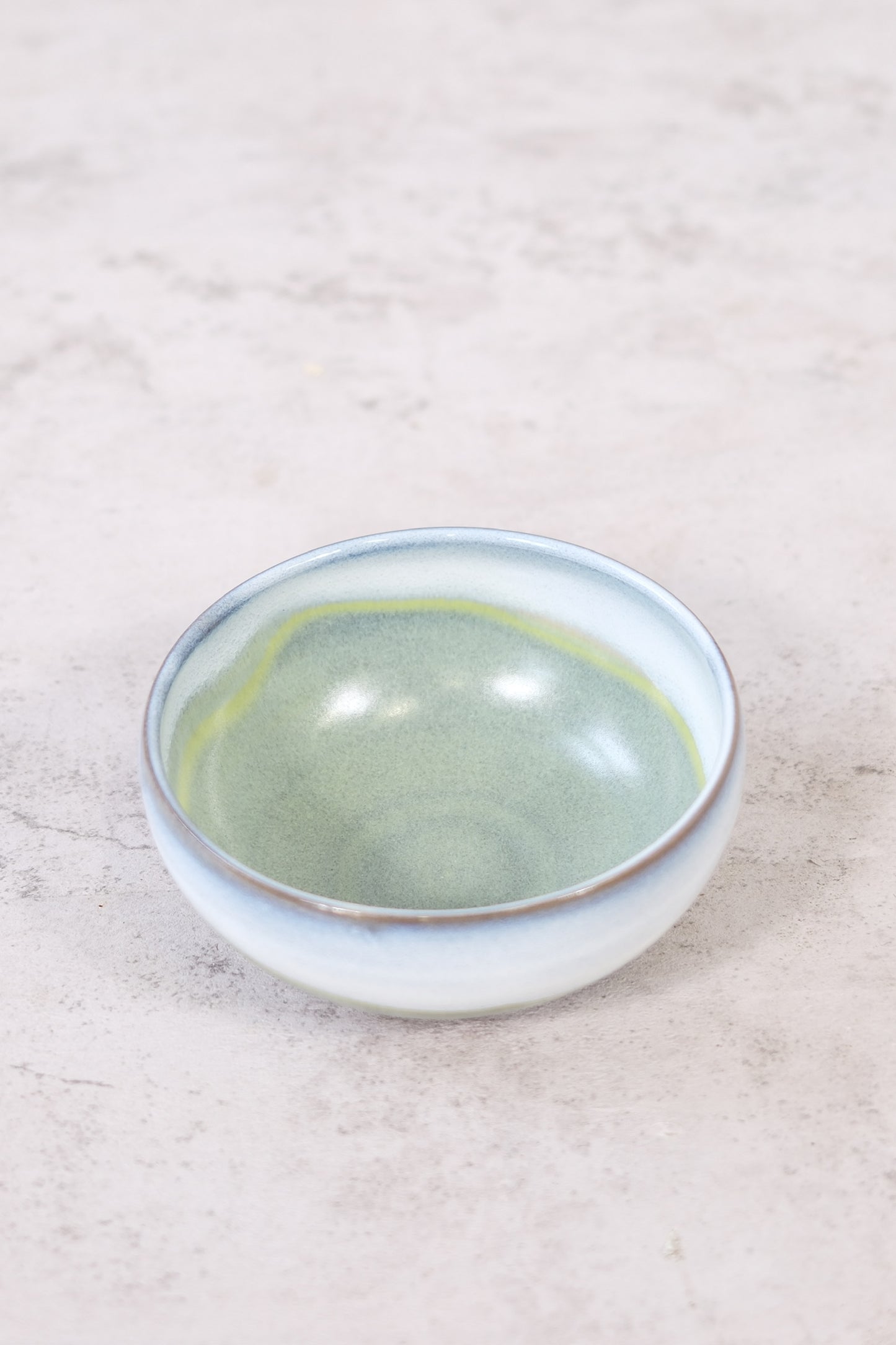 Japanese ceramic bowl with green glaze