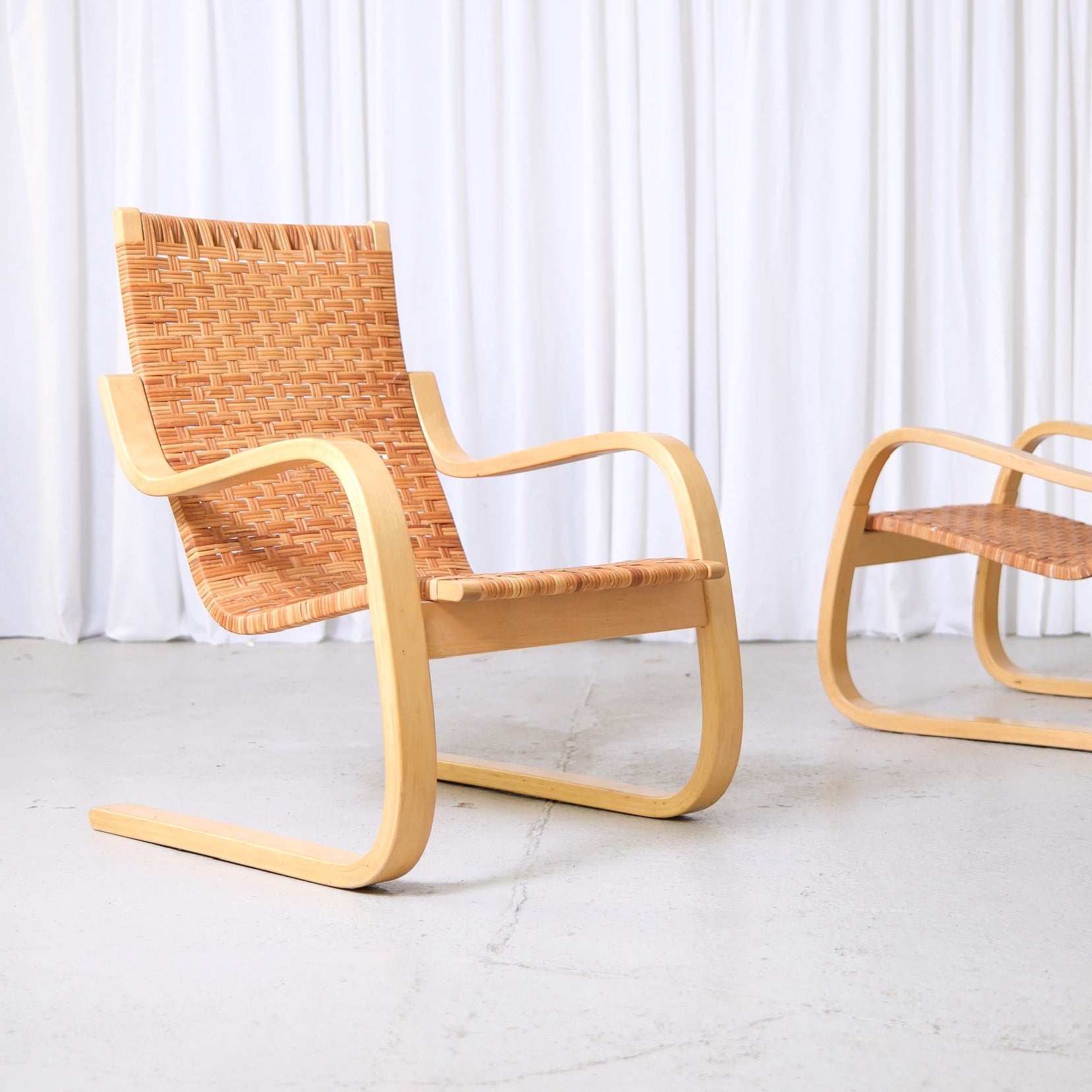 Alvar Aalto 406 Lounge Chairs with Rattan for Artek – Pino Interiors