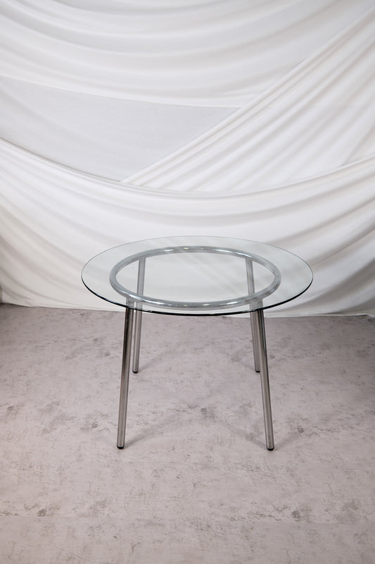 クローム脚のヴィンテージガラステーブル