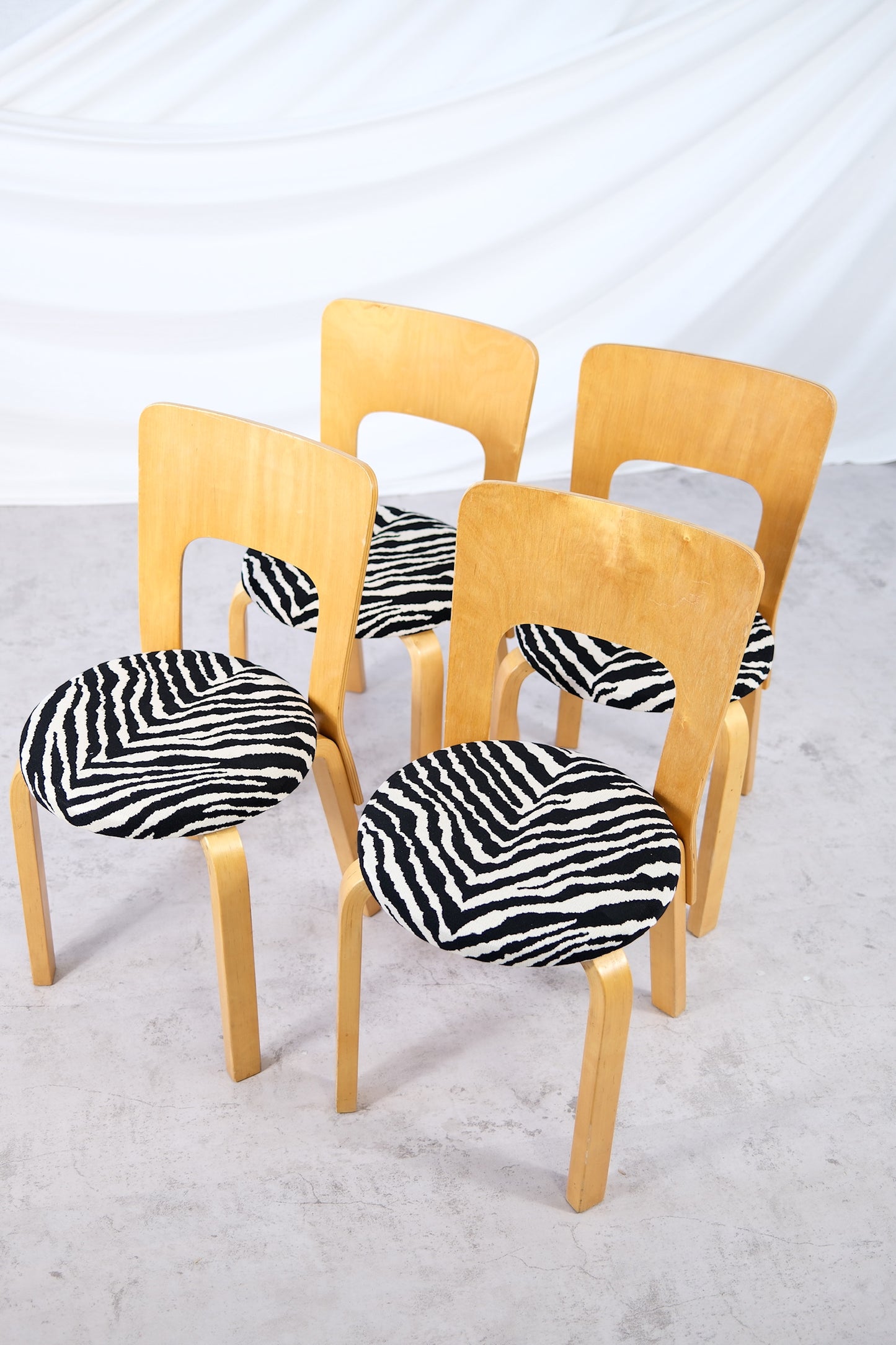 Artek 66 Chairs with Zebra Upholstery, by Alvar Aalto
