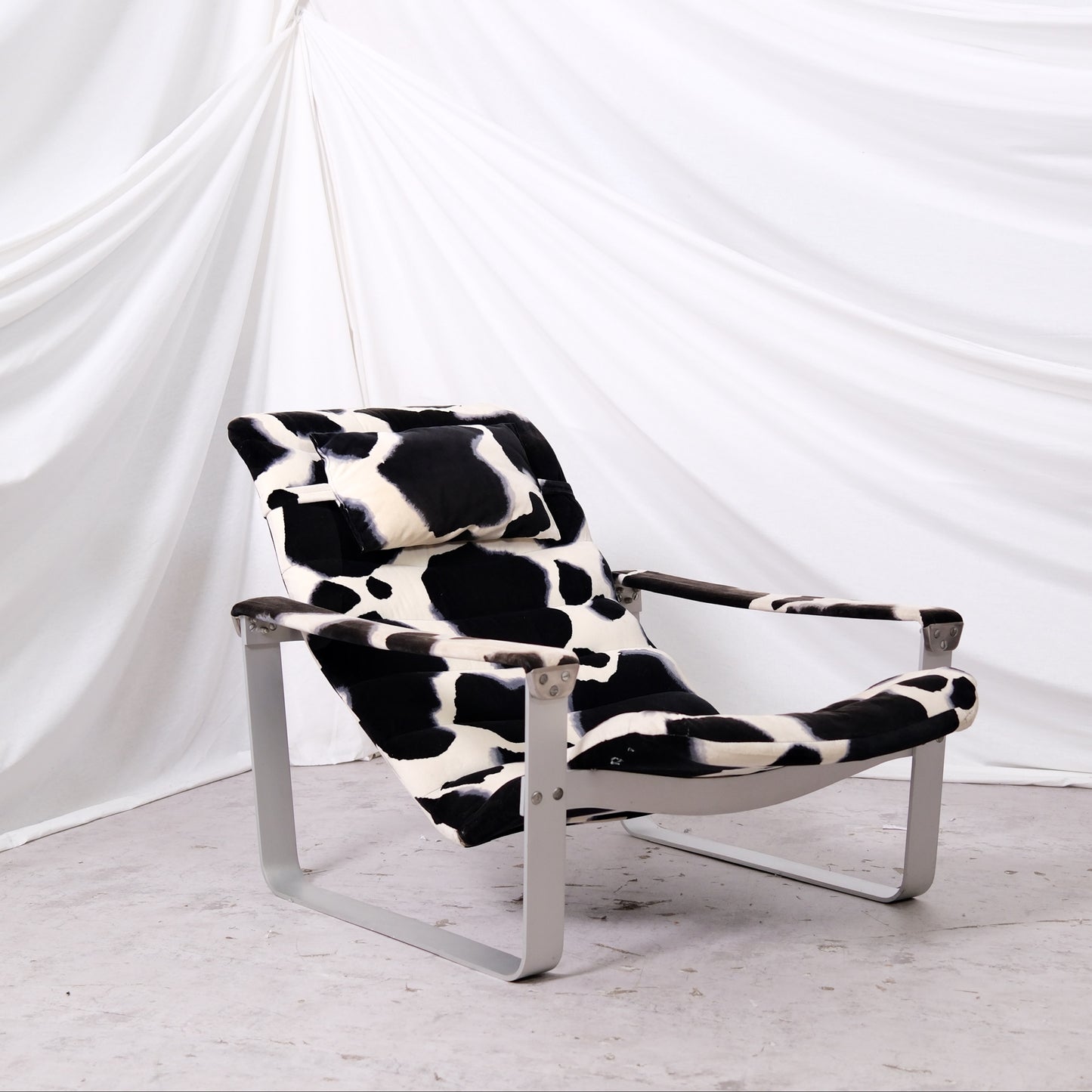 Ilmari Lappalainen Pulkka Lounge Chair with Ottoman – Cowhide Print Canvas