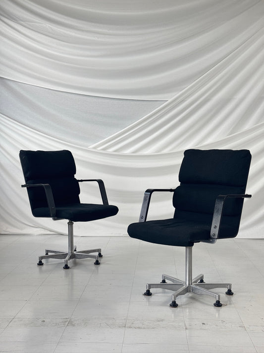 Pair of vintage Yrjö Kukkapuro Plaano office chairs with black upholstery, aluminum base, and armrests — designed for Avarte, Finland.