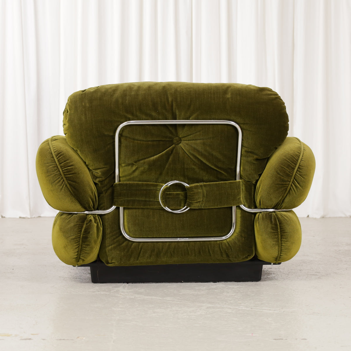 Isku Hannibal armchair in green velvet, rear view with chrome frame