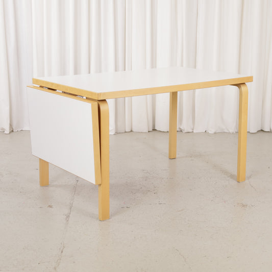 Alvar Aalto large drop-leaf table for Artek, white laminate top and birch frame
