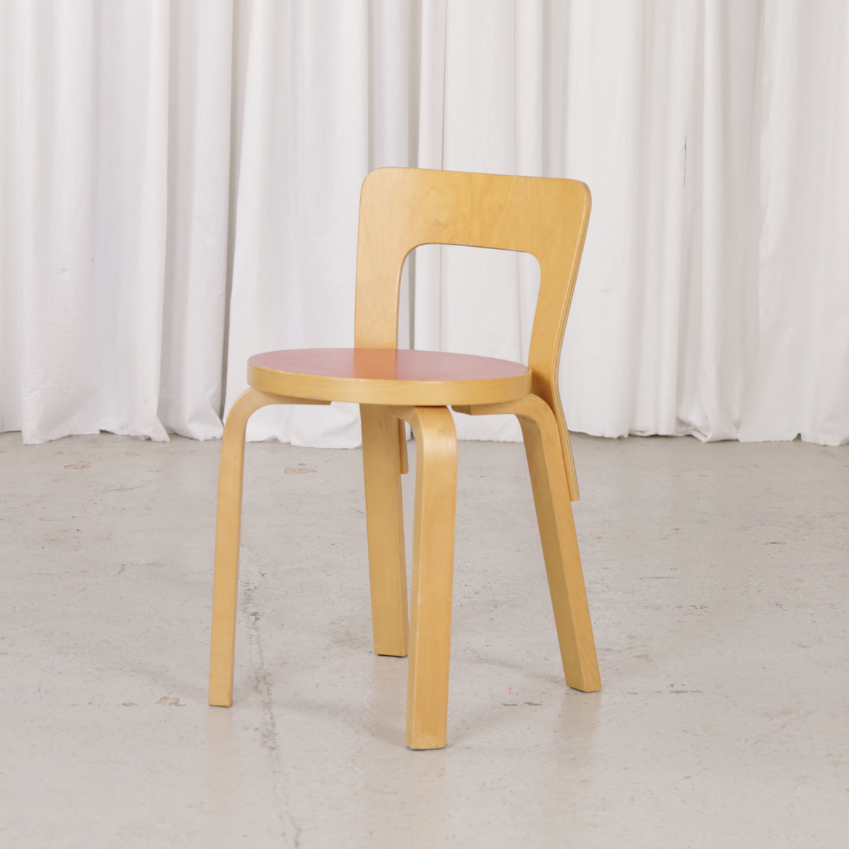Artek Chair 65 by Alvar Aalto in birch and red linoleum