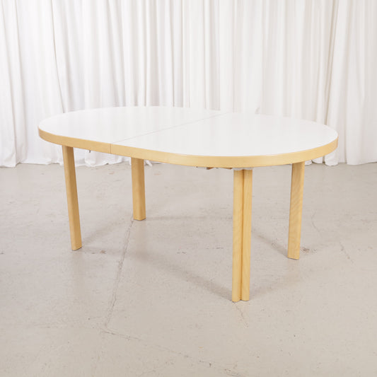 Artek H99 extendable table in white laminate and birch — full table view