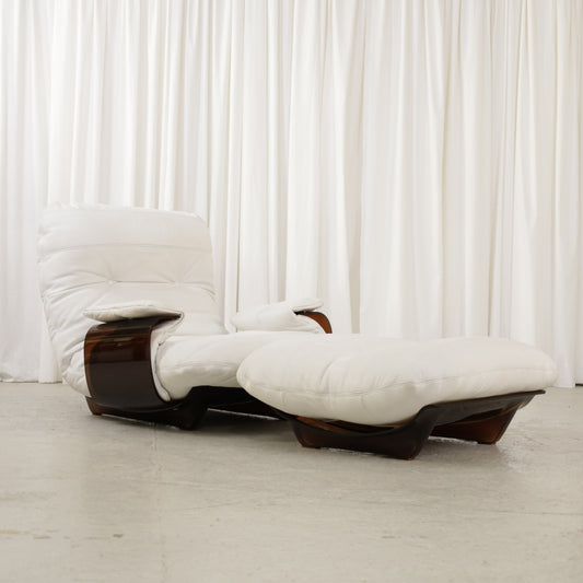 White lounge chair with matching footstool, front view