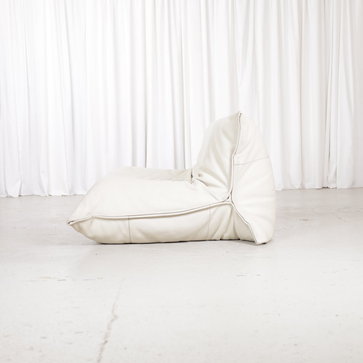 Cream leather Yoko sofa, side view