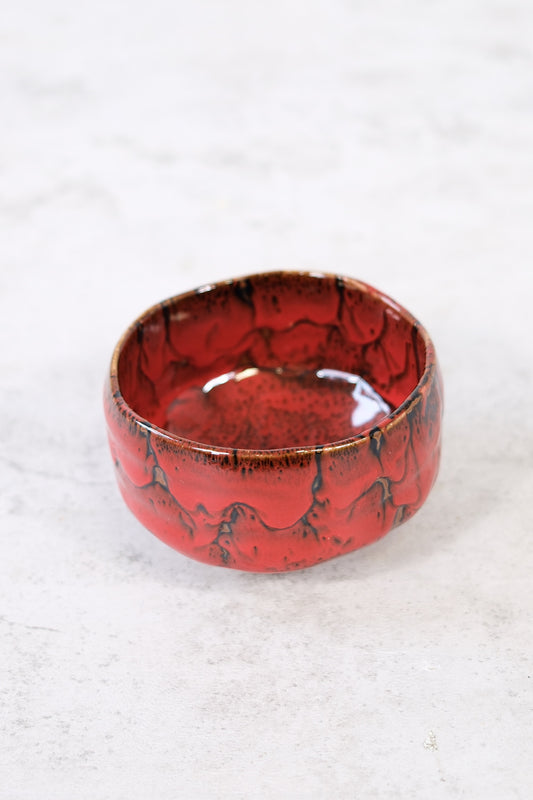 Japanese ceramic bowl with red lava glaze