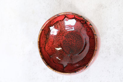 Japanese ceramic bowl with red lava glaze