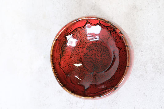 Japanese ceramic bowl with red lava glaze