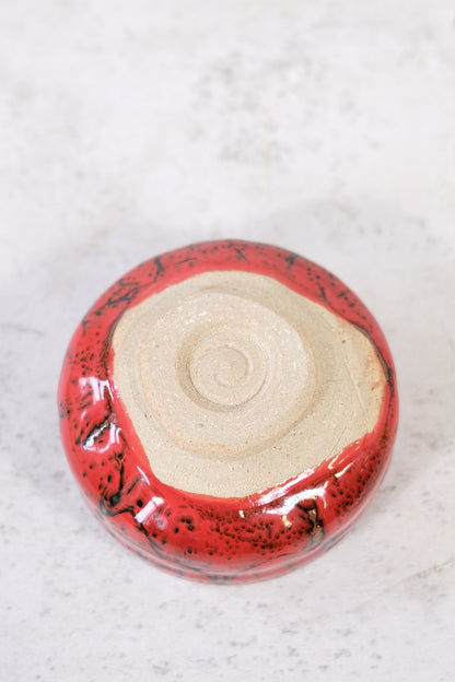 Japanese ceramic bowl with red lava glaze