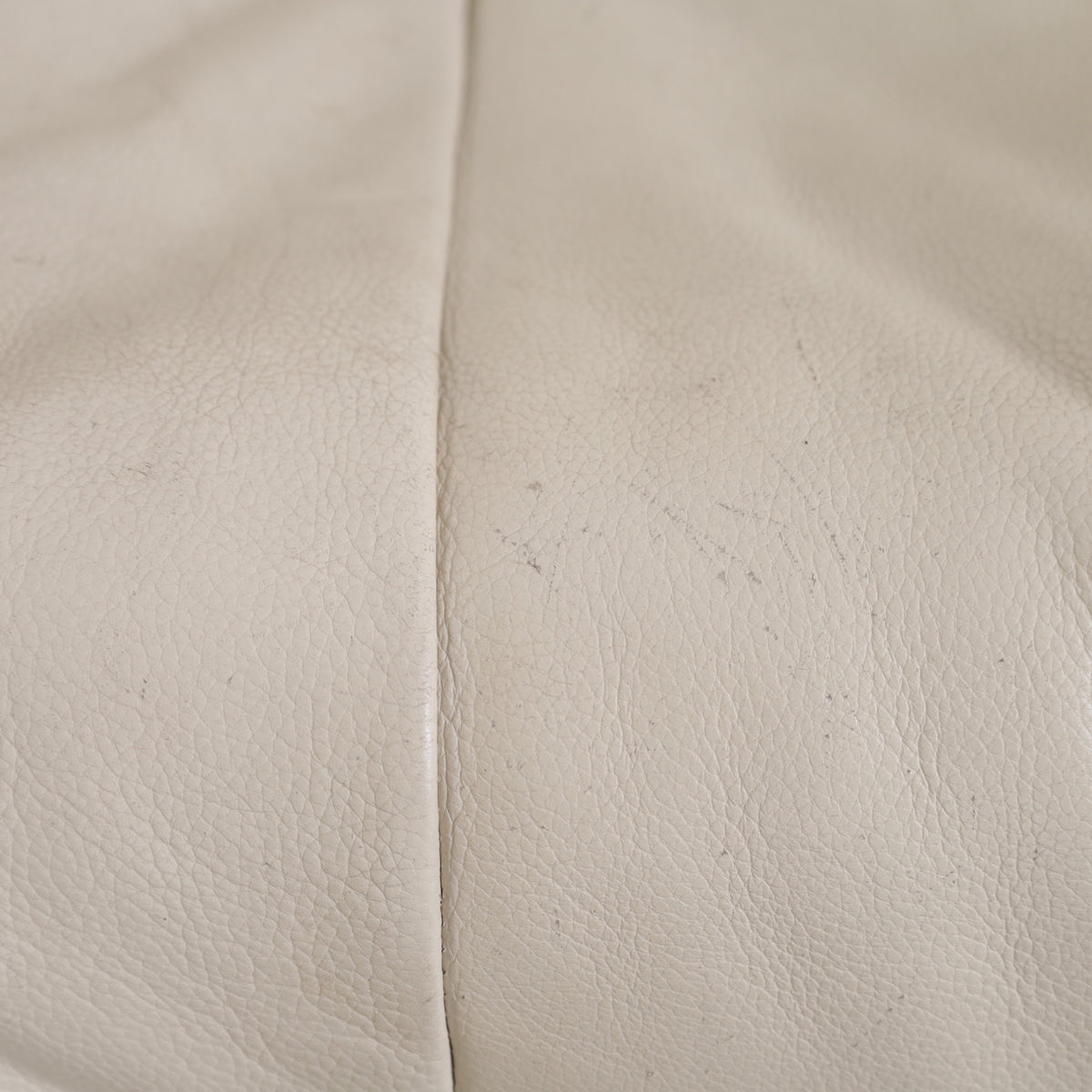 Close-up of wear and small scratches on Yoko leather