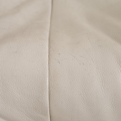 Close-up of wear and small scratches on Yoko leather