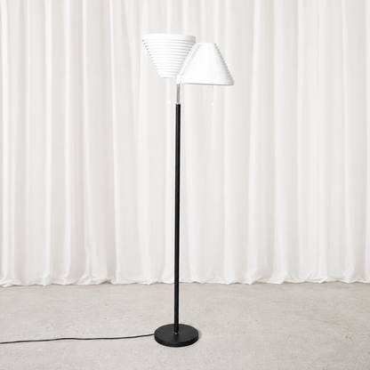Vintage Alvar Aalto A810 floor lamp for Artek with polished stainless steel details. An iconic Finnish lighting design originally created in 1959.