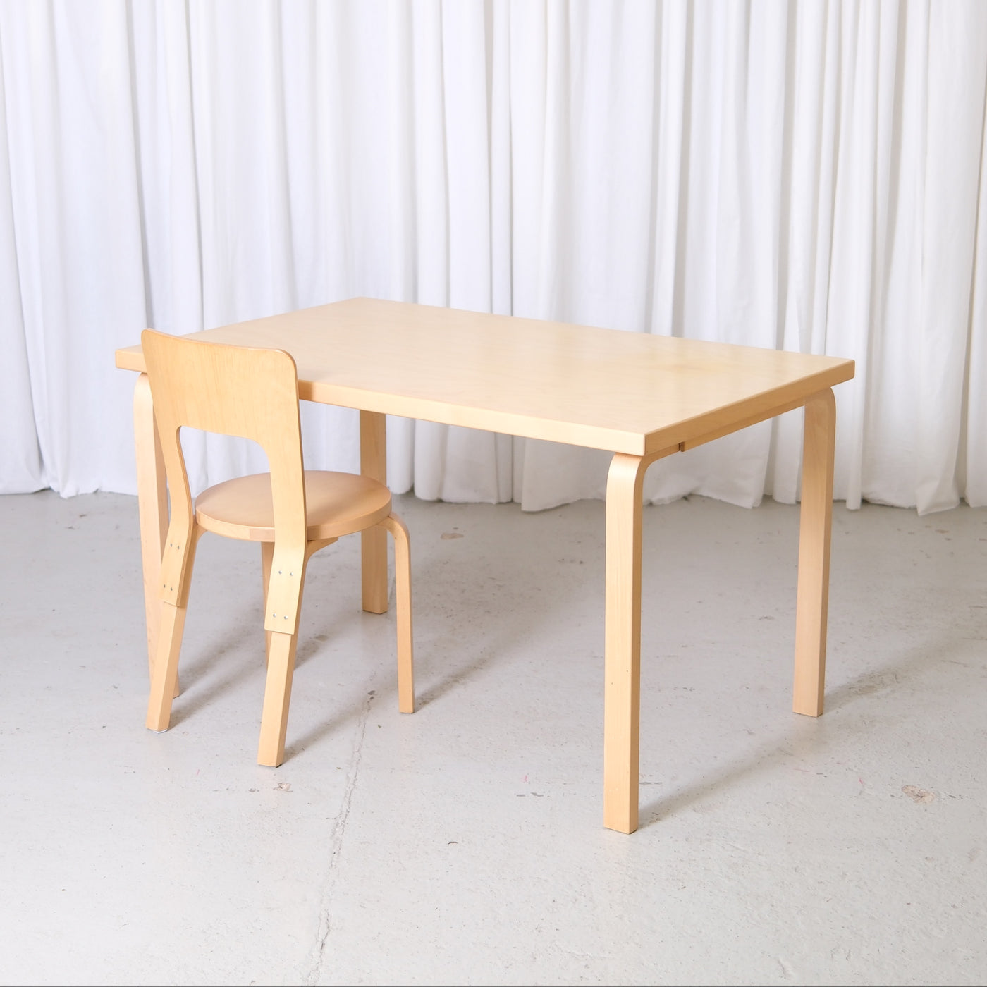 Vintage Alvar Aalto Artek 81B table in birch with bentwood legs photographed in Pino Interiors showroom
