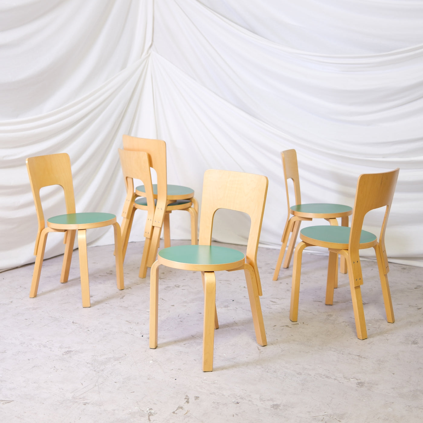 Vintage Alvar Aalto Chair 66 by Artek from 1998 with natural birch frame and green linoleum seat. Good vintage condition. Available individually.