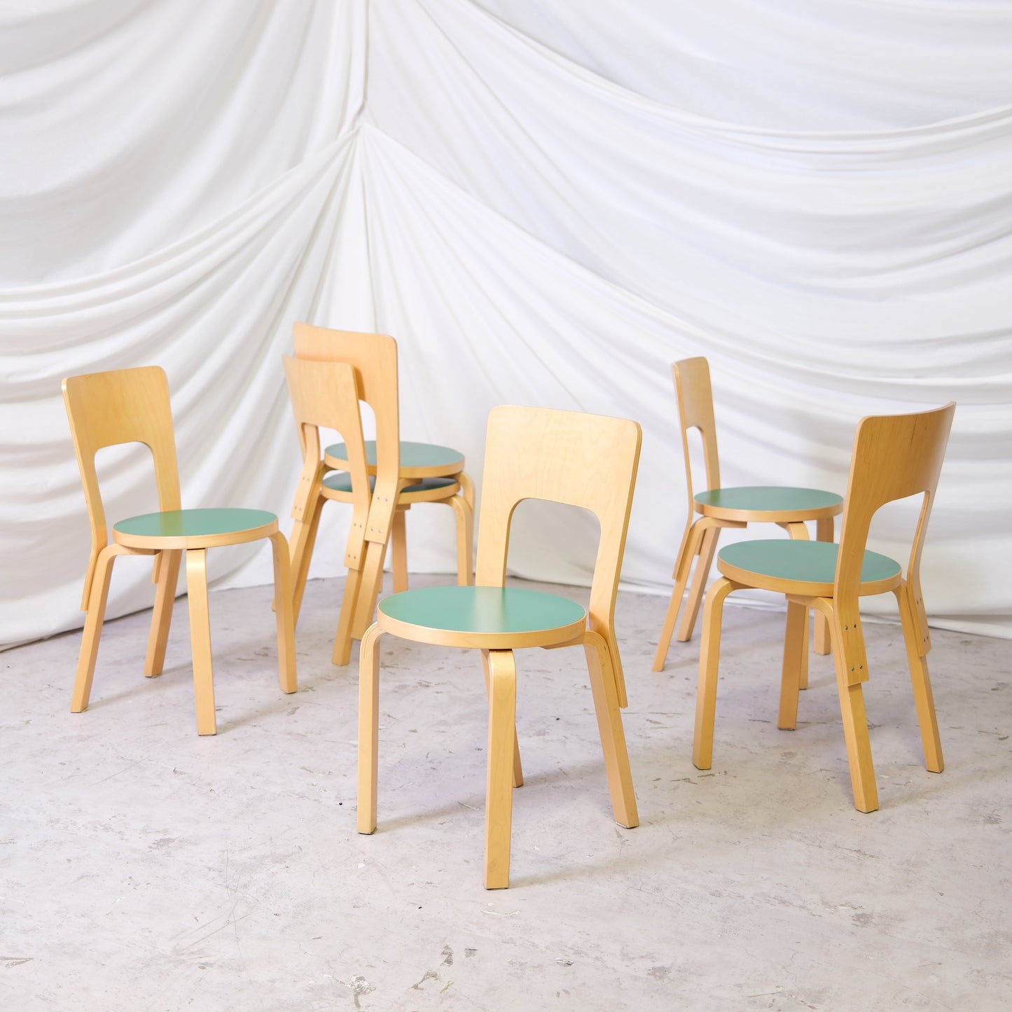 Vintage Alvar Aalto Chair 66 by Artek from 1998 with natural birch frame and green linoleum seat. Good vintage condition. Available individually.