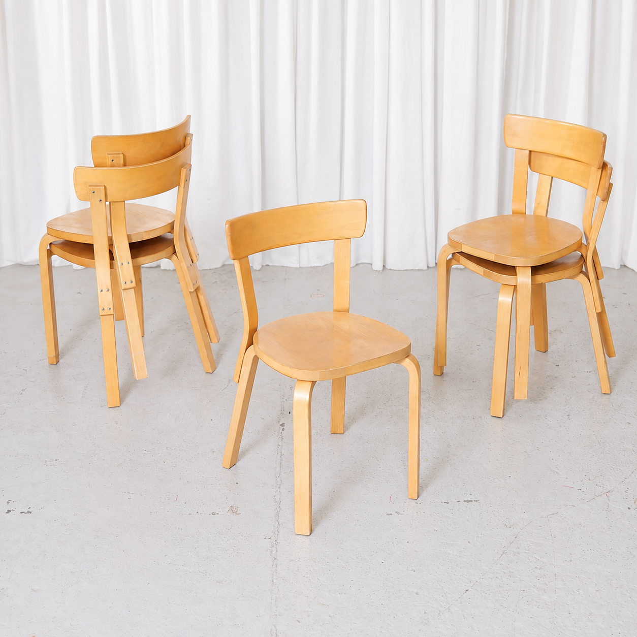 Vintage Artek Chair 69 designed by Alvar Aalto in birch. Beautiful aged patina with minor veneer wear and signs of use.