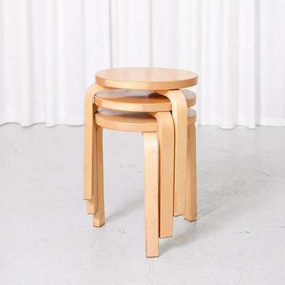 Vintage Alvar Aalto Stool 60 for Artek from the 1960s, featuring an early finger-jointed seat edge, aged birch surfaces and beautiful natural patina.