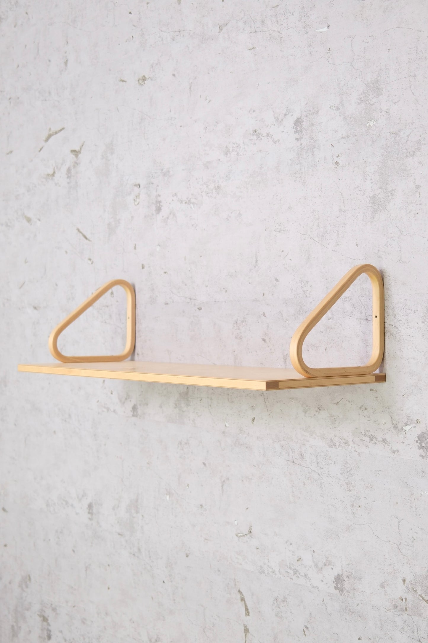 Artek 112A shelf designed by Alvar Aalto. Birch wall shelf in very clean condition. Timeless Scandinavian modern design and authentic Finnish furniture.