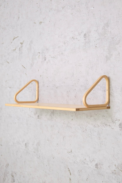 Artek 112A shelf designed by Alvar Aalto. Birch wall shelf in very clean condition. Timeless Scandinavian modern design and authentic Finnish furniture.