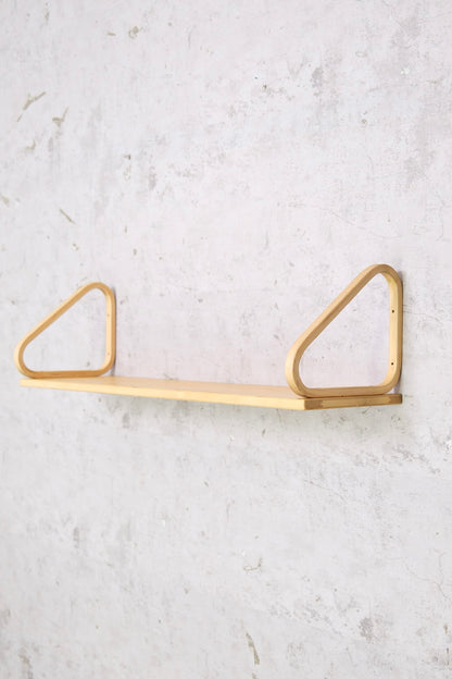 Artek 112B shelf designed by Alvar Aalto. Birch wall shelf with beautiful patina in good condition. Authentic Scandinavian modern design.