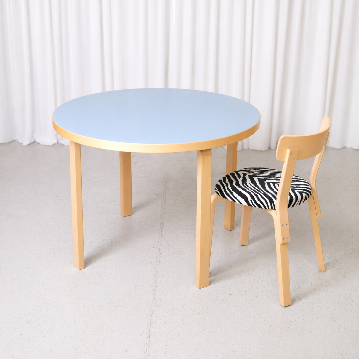 Original Artek 90A table with a blue laminate top and natural birch legs, designed by Alvar Aalto. Manufactured in 2013 and in excellent condition.