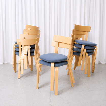 Vintage Artek Chair 69 by Alvar Aalto with a natural birch frame and blue Alcantara upholstered seat. A timeless classic of Finnish design.