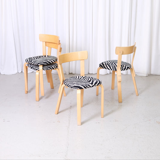 Artek Chair 69 by Alvar Aalto with birch frame and zebra-patterned upholstery, vintage Finnish design dining chair.