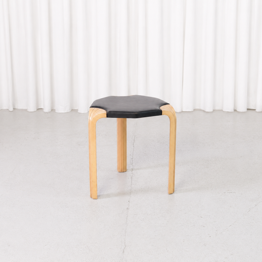 Artek X602 stool by Alvar Aalto with birch fan legs and black leather seat