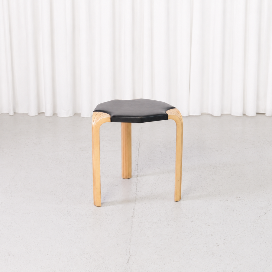 Artek X602 stool by Alvar Aalto with birch fan legs and black leather seat