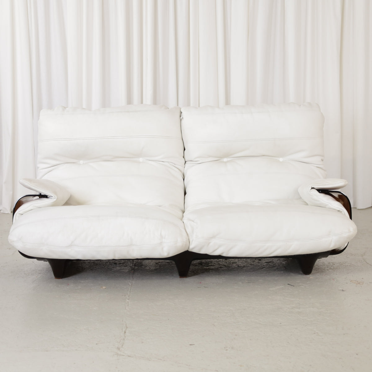 Front view of the white two-seater sofa