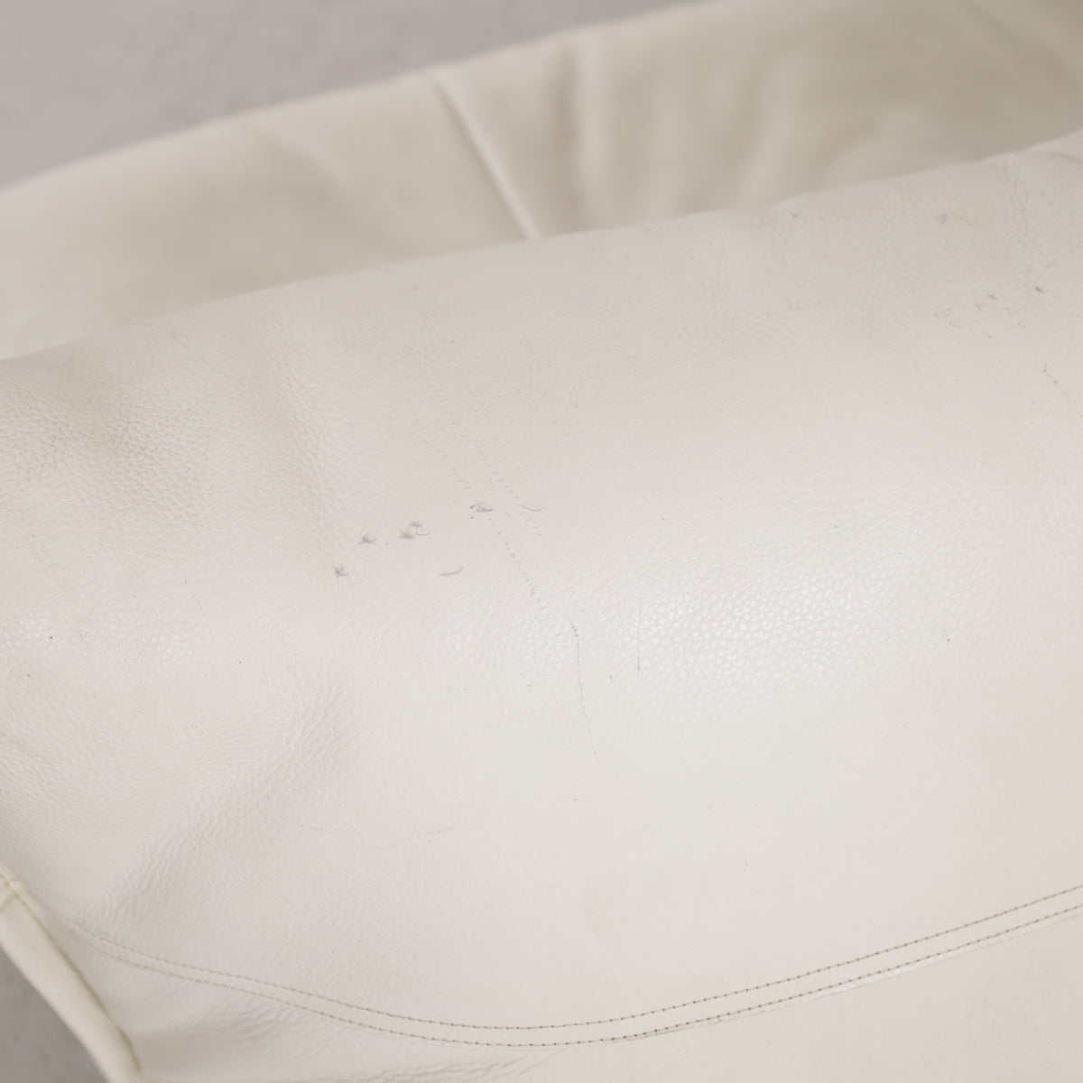 Surface wear on the Yoko sofa leather