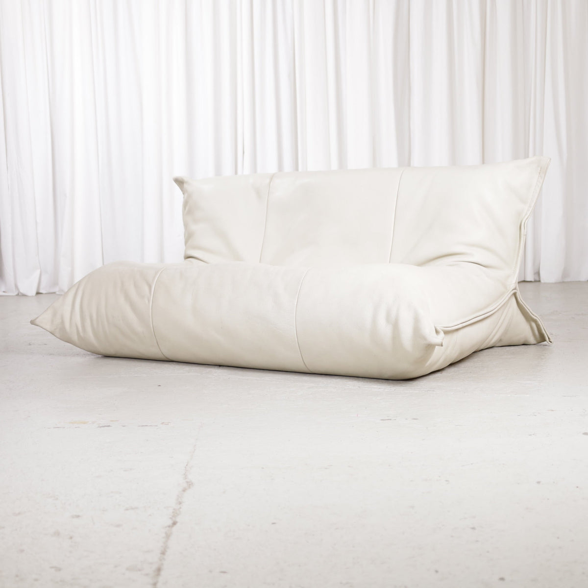 Michel Ducaroy Yoko two-seater sofa in cream leather, front angle