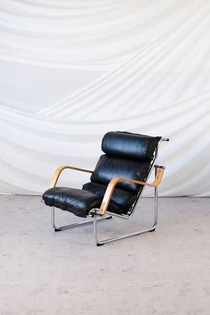 Yrjö Kukkapuro Remmi Armchair Black Leather, Chrome & Wooden Armrests