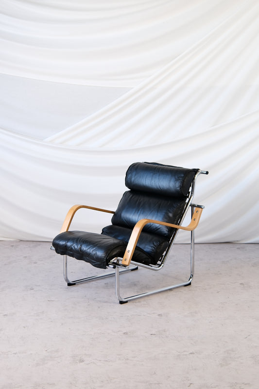 Yrjö Kukkapuro Remmi Armchair Black Leather, Chrome & Wooden Armrests