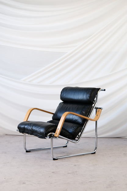 Yrjö Kukkapuro Remmi Armchair Black Leather, Chrome & Wooden Armrests
