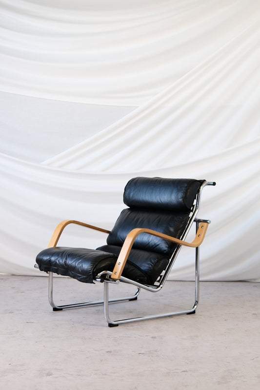 Yrjö Kukkapuro Remmi Armchair Black Leather, Chrome & Wooden Armrests