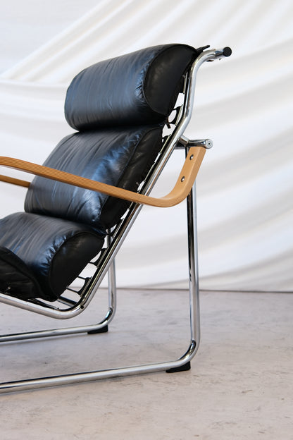 Yrjö Kukkapuro Remmi Armchair Black Leather, Chrome & Wooden Armrests