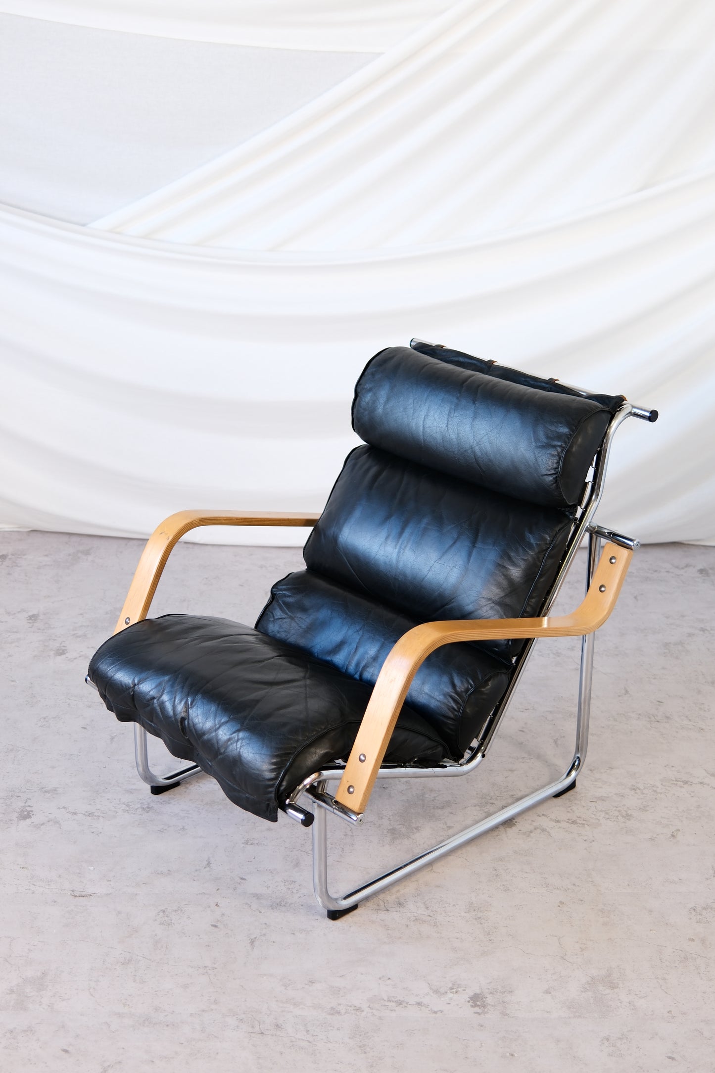 Yrjö Kukkapuro Remmi Armchair Black Leather, Chrome & Wooden Armrests