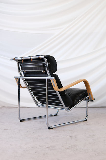 Yrjö Kukkapuro Remmi Armchair Black Leather, Chrome & Wooden Armrests