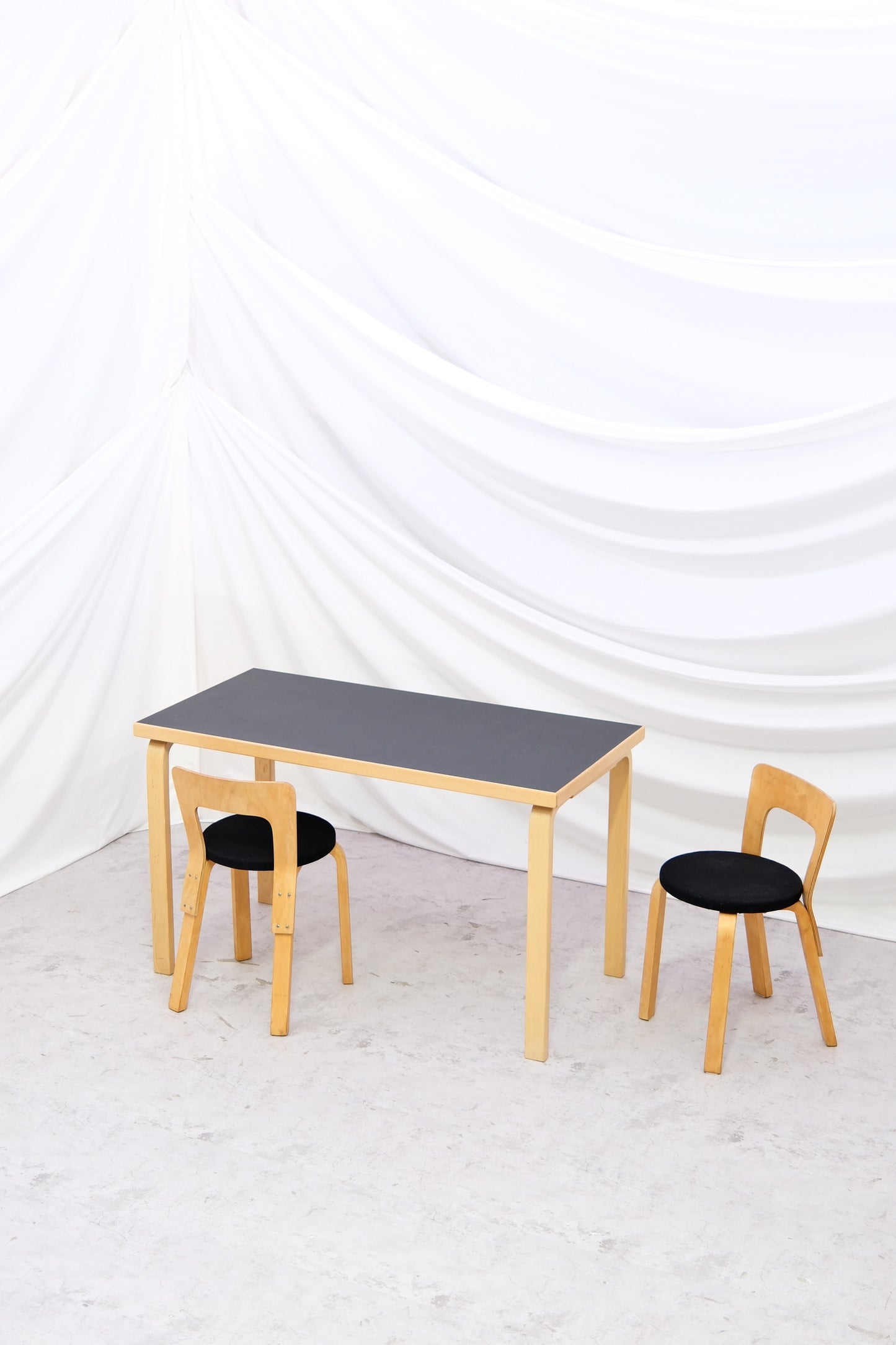 Vintage Alvar Aalto Artek 81B table with black linoleum top