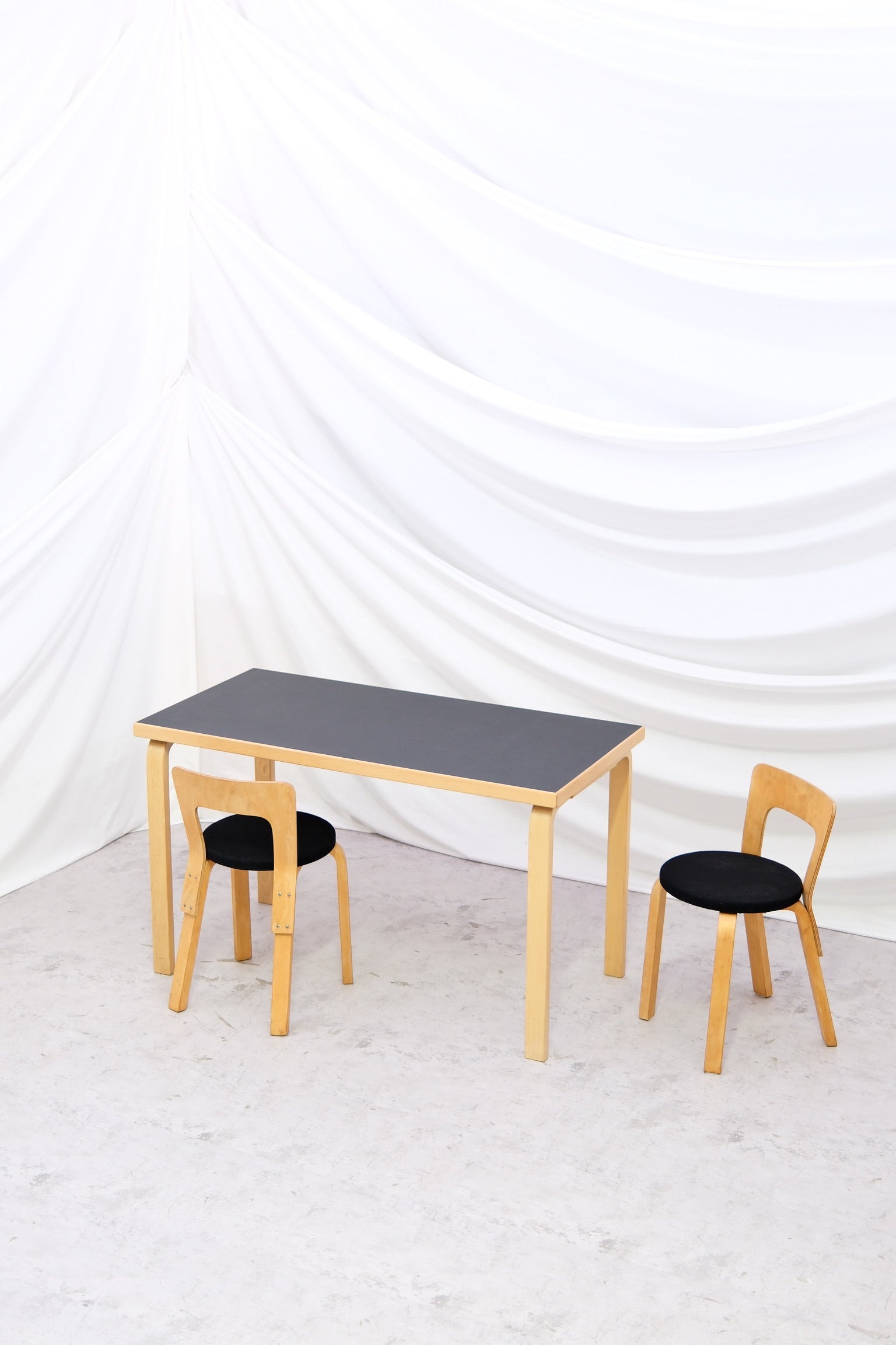 Vintage Alvar Aalto Artek 81B table with black linoleum top