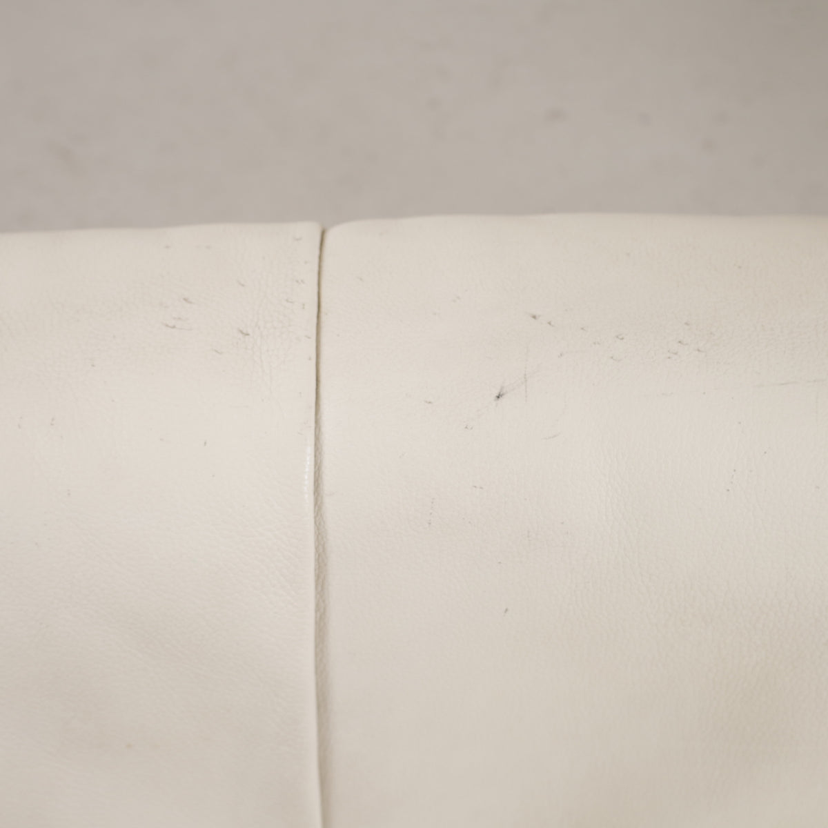 Leather upholstery detail with visible marks