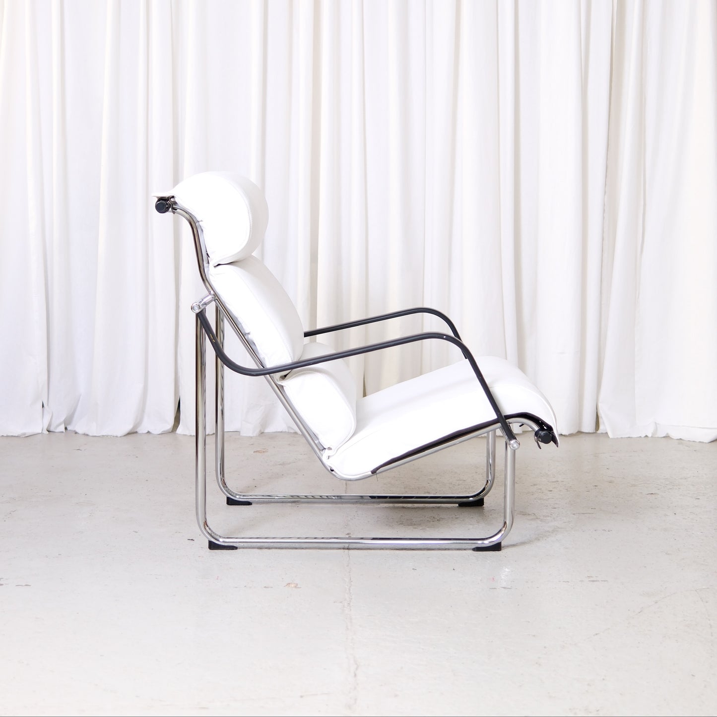 Yrjö Kukkapuro Remmi Lounge Chair and Ottoman in White Leather