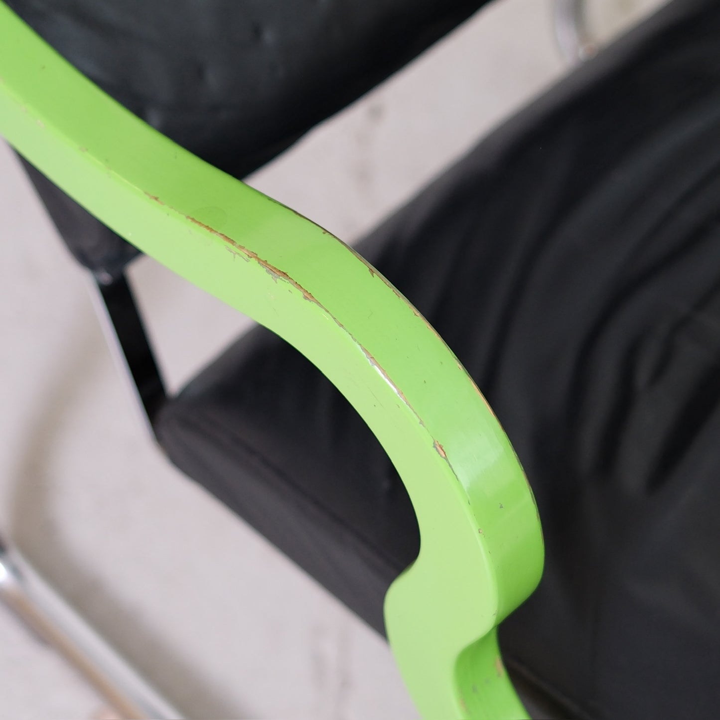Yrjö Kukkapuro Experiment Lounge Chair in Black Leather and Green Armrests