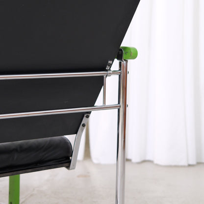 Yrjö Kukkapuro Experiment Lounge Chair in Black Leather and Green Armrests