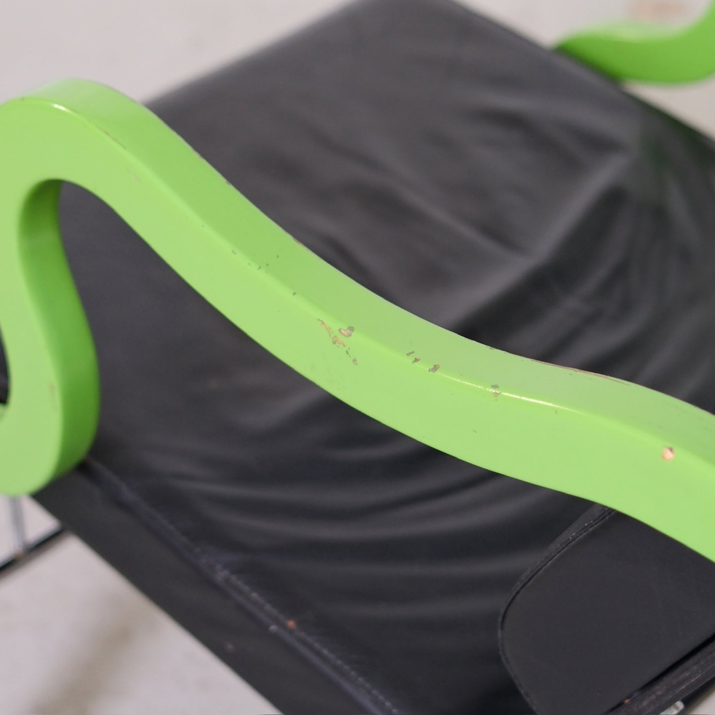 Yrjö Kukkapuro Experiment Lounge Chair in Black Leather and Green Armrests